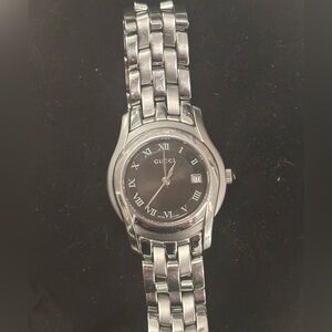 Gucci Silver Timepiece with Black Dial